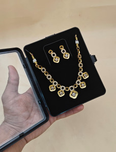 Elegant Gold Tone Geometric Necklace Set with Crystal Stones