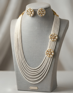 Elegant Multi-Strand Ivory Seed Pearl Long Haar with Kundan Floral Brooches
