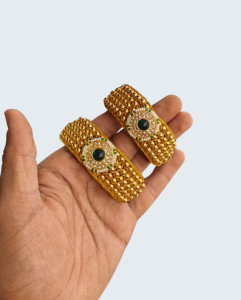 Traditional Rajasthani Gold-Plated Pochi Wristlet with Emerald Green Kundan Medallion