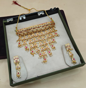 Royal Gold-Plated Choker Set with Tiered Jhala Drops and Ruby-Pink Accents