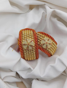 Traditional Gokhru-Style Rajasthani Poonchi with Radiant Wheel Centerpiece