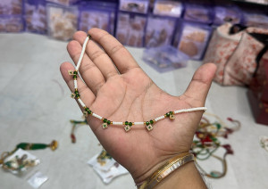 Elegant White Beaded Anklet with Green Crystal & Gold-Tone Charm Drops